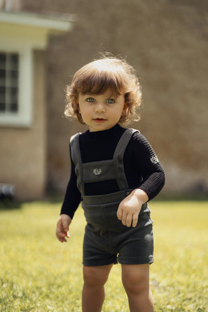 Charlotte & George (New) - Black Mock Neck Knitted Emblem Sleeve Rib Top